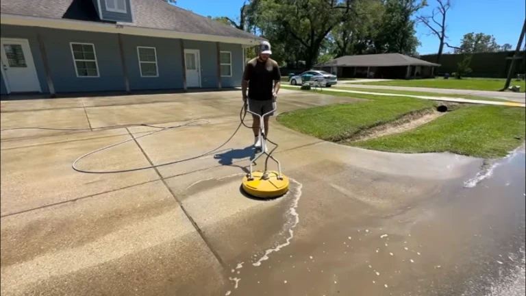 Rotating surface cleaner cleaning a concrete driveway in Springfield MO